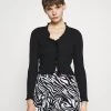 Nly by Nelly FRILL EDGE Strickjacke - Elegante Strickjacke für Damen in Schwarz -Nly by Nelly Verkaufsladen 00195b51b6514de7919f7e82d8abf689