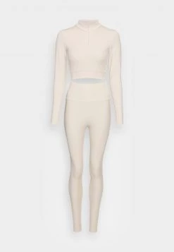 Nly by Nelly SPORTY ZIP SET - Leggings in Greige für Damen | Bequeme Sportbekleidung -Nly by Nelly Verkaufsladen 53f7d25cbe2a475b9d2595a26f0033f2