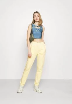 Nly by Nelly COZY PANTS - Bequeme Jogginghose für Damen in Gelb -Nly by Nelly Verkaufsladen 9885504d7d694d3e9772df0f8da80456