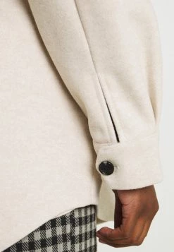 Nly by Nelly MY DEAREST SHACKET - Kurzmantel in Light Beige für Damen | Stilvoller Übergangsjacke -Nly by Nelly Verkaufsladen b3be1c3660c444459a36116fad69b087