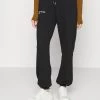 Nly by Nelly EMBROIDERED PANTS - Jogginghose Damen Schwarz -Nly by Nelly Verkaufsladen bc74e2ad3da9498e8b486f40977cd022